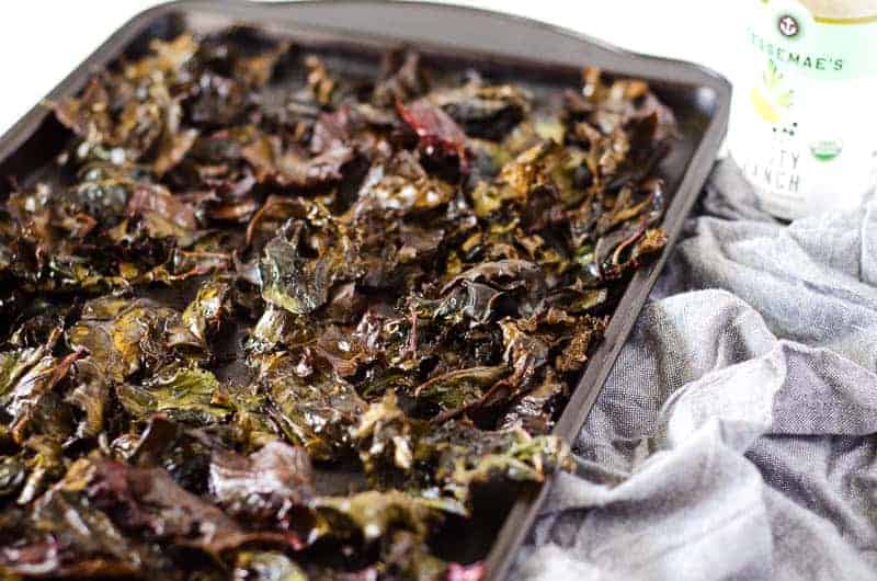 baked kale chips on a baking sheet