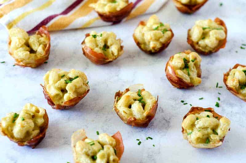 gluten free mac and cheese bites laid out on a kitchen counter