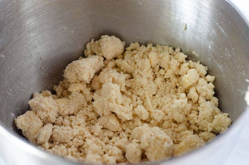 Close up of gluten free crumble topping in mixing bowl
