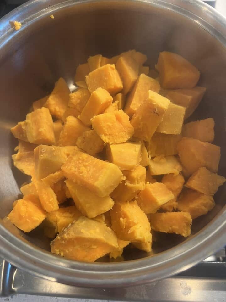 cooked sweet potatoes cubes in a pot